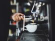 Close-up of Hand Holding Coffee Machine